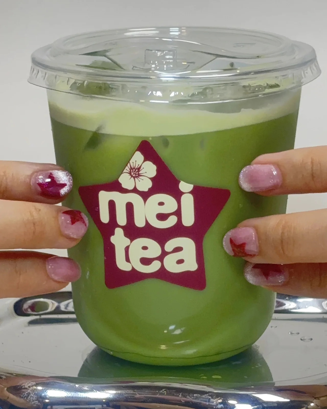 An iced Mei Tea matcha drink