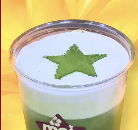 Mei Tea’s star traced in matcha on the surface of a latte